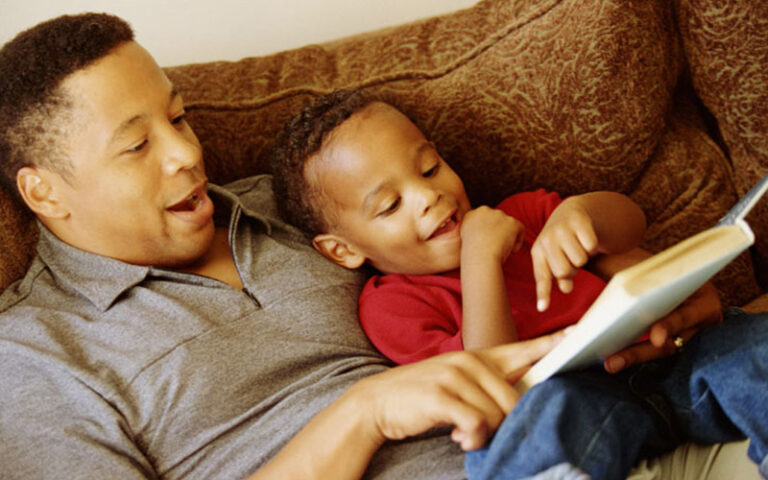 happy, warm dad and son