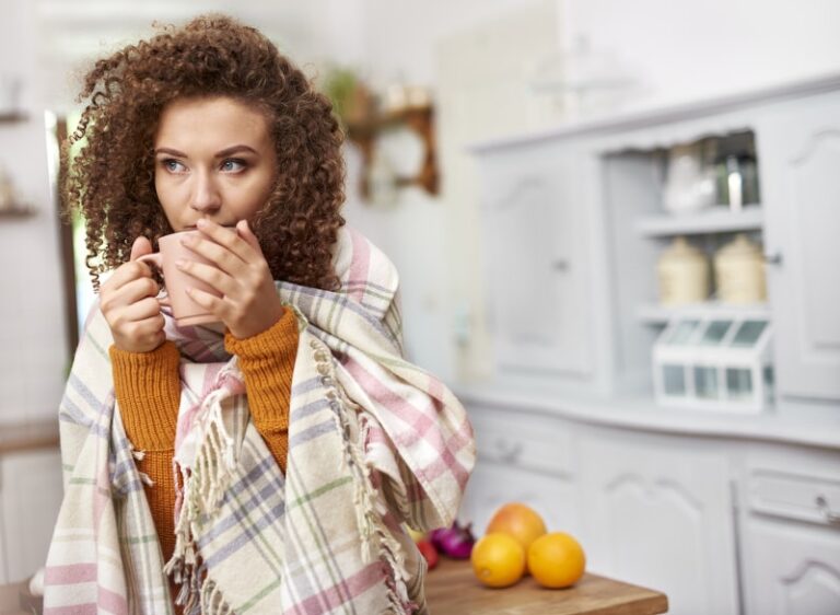 keeping heating bills low by layering clothes